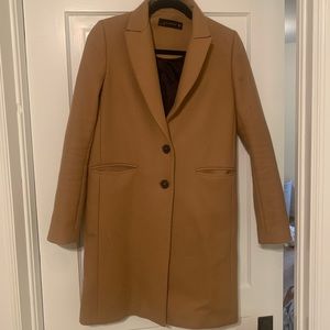 Camel colour men’s wear style coat.